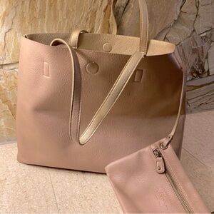 G.H. Bass & Co. tote in a shade of rose pink and gold with pink zippered pocket